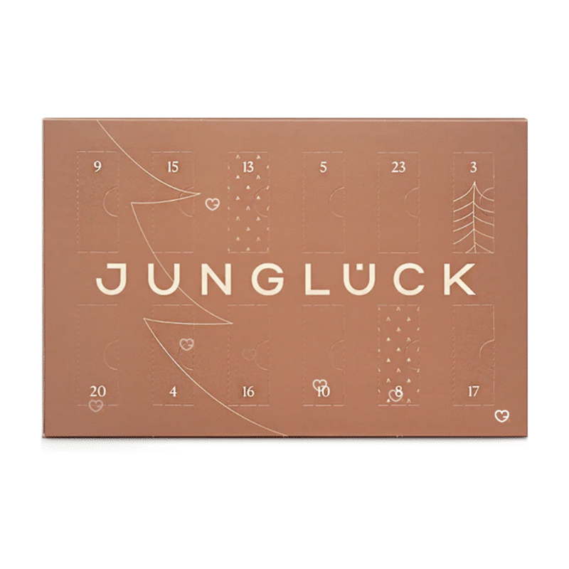 JUNGLÜCK Adventskalender 2025 mit 24 veganen Naturkosmetik-Minis, Bestseller-Seren und Gutschein in limitierter Box.