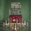 Penhaligon's Adventskalender 2026, offene Schubladen mit Produkten, grüner Hintergrund