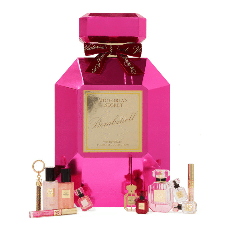 Victoria's Secret Adventskalender 2025 mit 12 Bombshell Beauty-Highlights wie Eau de Parfum, Gloss und Mini Mists in festlicher Box.