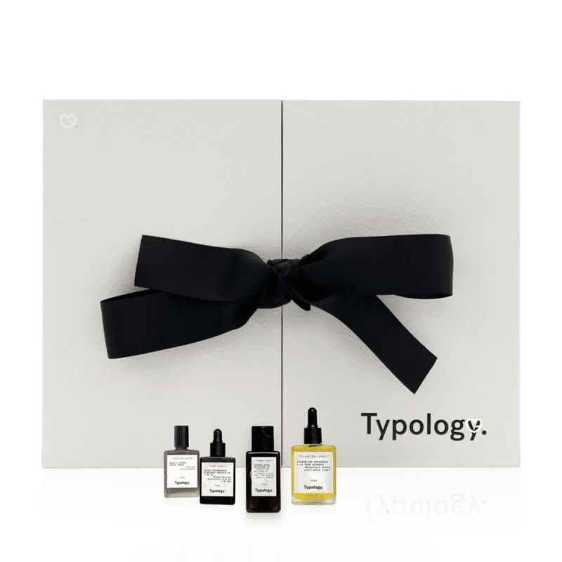 Typology Adventskalender 2025 mit 24 natürlichen Pflegeprodukten für Gesicht, Augen, Lippen, Haare und Körper in minimalistischer Box.