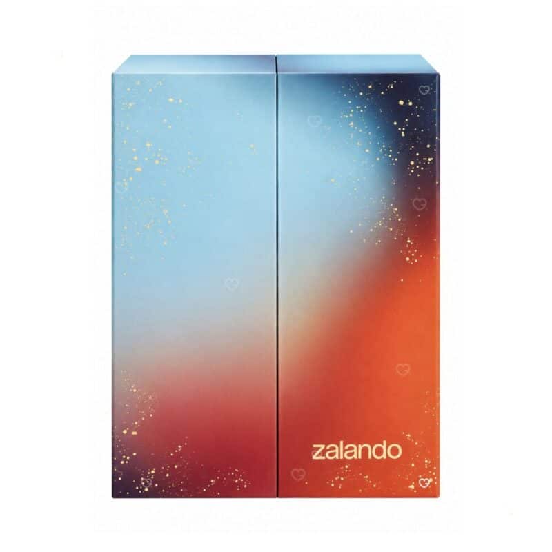 Zalando Beauty Adventskalender 2026, geschlossene Box im blau-orangen Farbverlauf mit goldenen Sprenkeln und Zalando-Logo, vor weißem Hintergrund