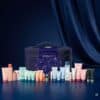 Payot Adventskalender 2026, alle 24 Pflegeprodukte aus zehn Markenlinien auf nachtblauem Hintergrund