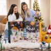 Paar öffnet den Degustabox Adventskalender 2026, XXL-Box im Weltraum-Design