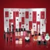 Giorgio Armani Adventskalender 2026 Set und Zylinderbox auf rotem Hintergrund