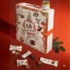 KoRo Adventskalender 2026 Classic Edition geöffnet mit Snacks und Pistaziencreme