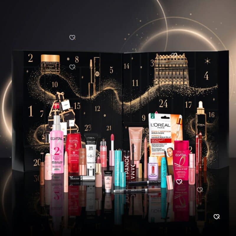 Geöffneter L'Oréal Paris Adventskalender 2026 mit allen 24 Make-up- und Pflegeprodukten ausgebreitet