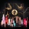 L'Oréal Paris Adventskalender 2026 mit Produkten vor schwarzem Hintergrund, Color Riche und Lumi Reihe