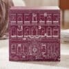 Westwing Adventskalender 2026 in Wohnsituation neben Design-Büchern