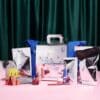 3INA Adventskalender 2026, geöffneter Tote Bag mit den Produkten der 24 Türchen