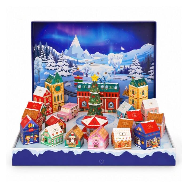 Legami Adventskalender 2026 Dream Peaks, aufgeklapptes Weihnachtsdorf mit 24 Häusern auf weißem Hintergrund